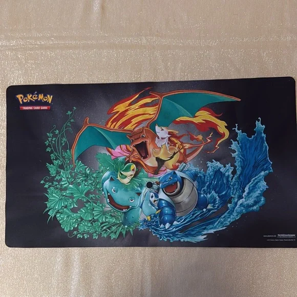 COPY - Pokemon trading card game mat & Nintendo Switch Pikachu case.